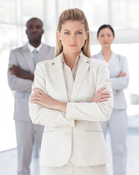 Serious business woman standing